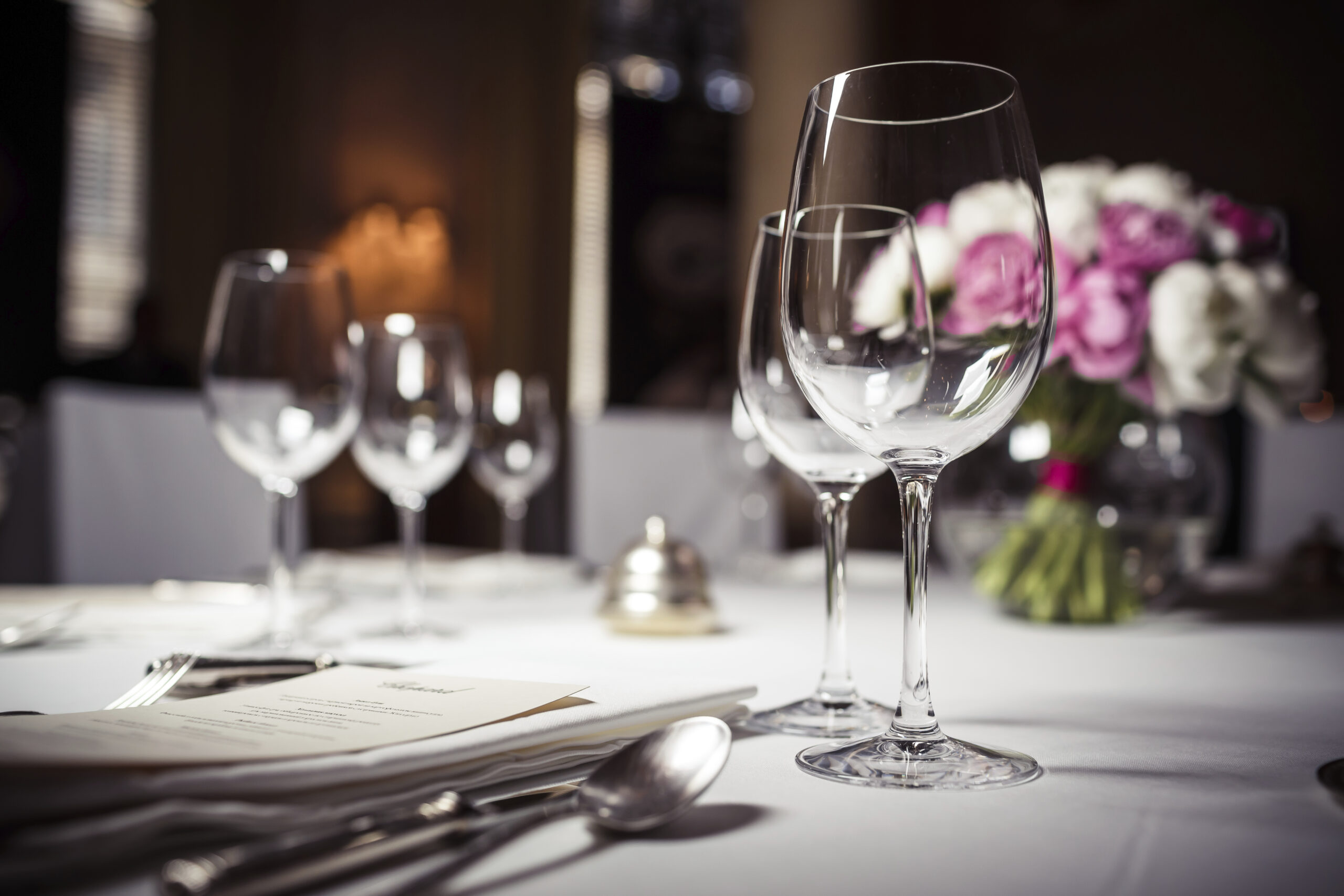 Сингулар. Vintage Style Wine on dinner Table.